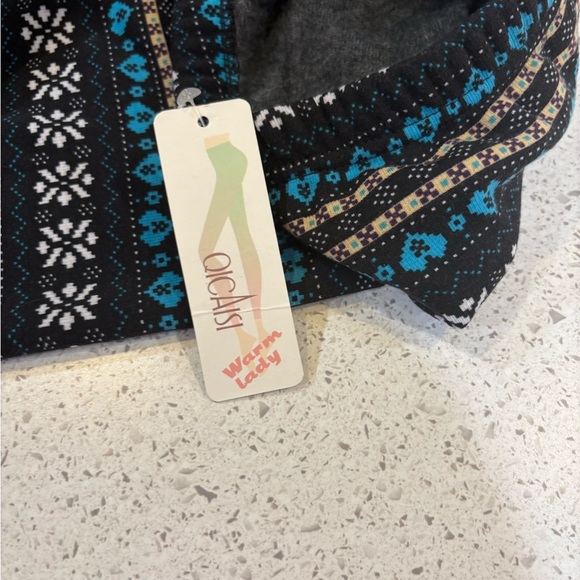 Qicaisi Patterned fleece lined Black and Blue Pants NWT - Picture 4 of 5